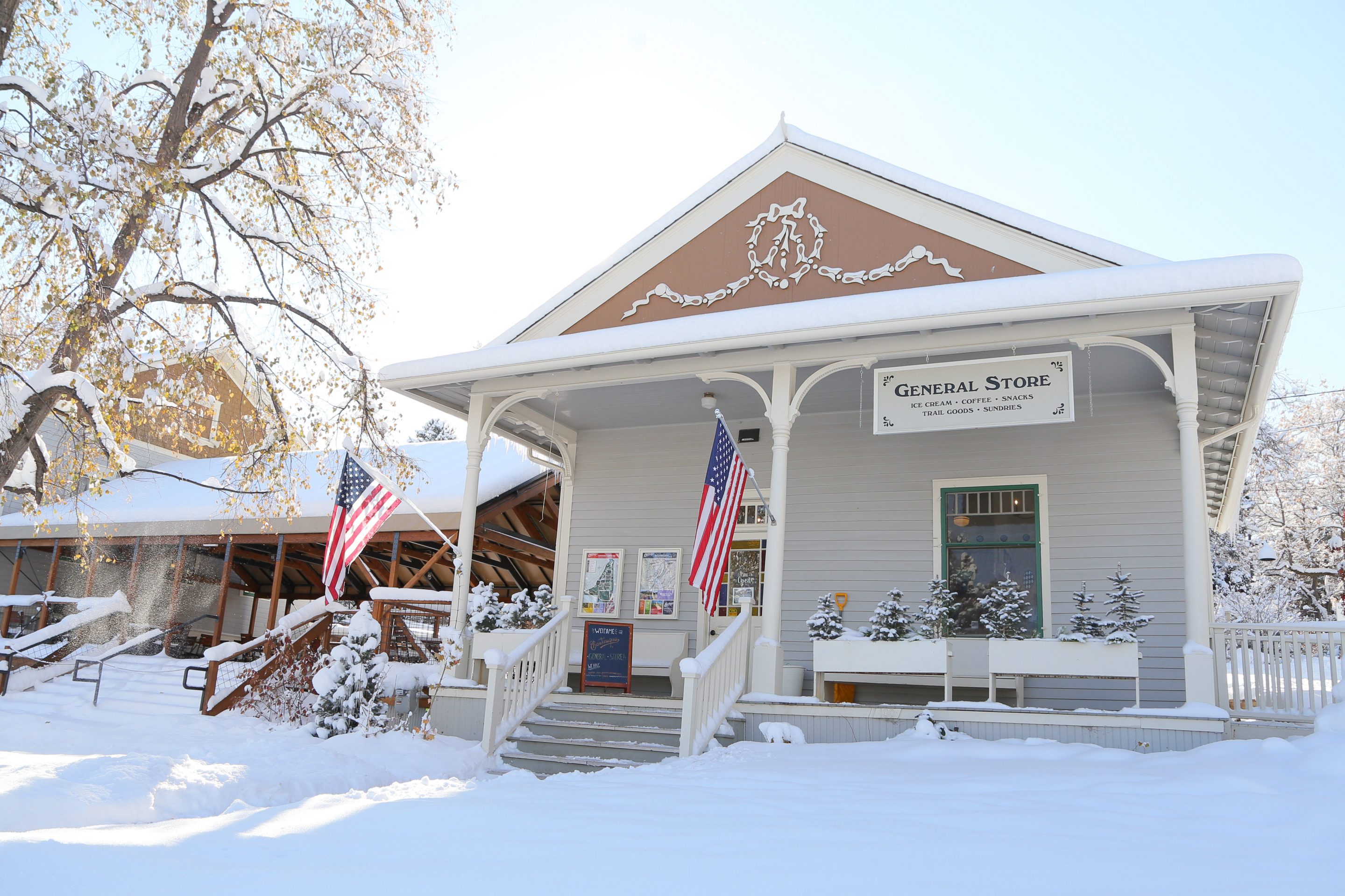 couple enter general store in summer